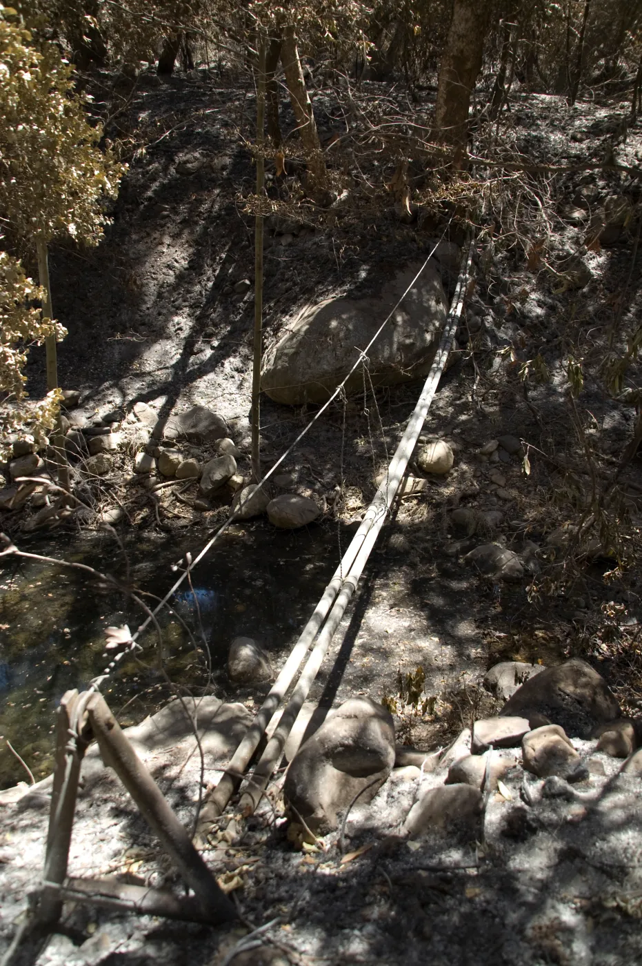 water pipes across Mission Creek after the Jesusita Fire