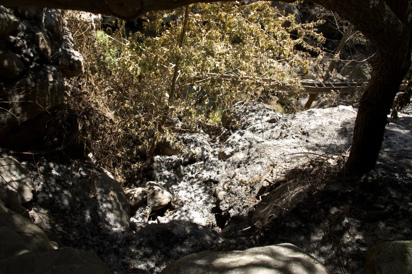 old wooden aqueduct and burned slope below Mission Dam after the Jesusita Fire