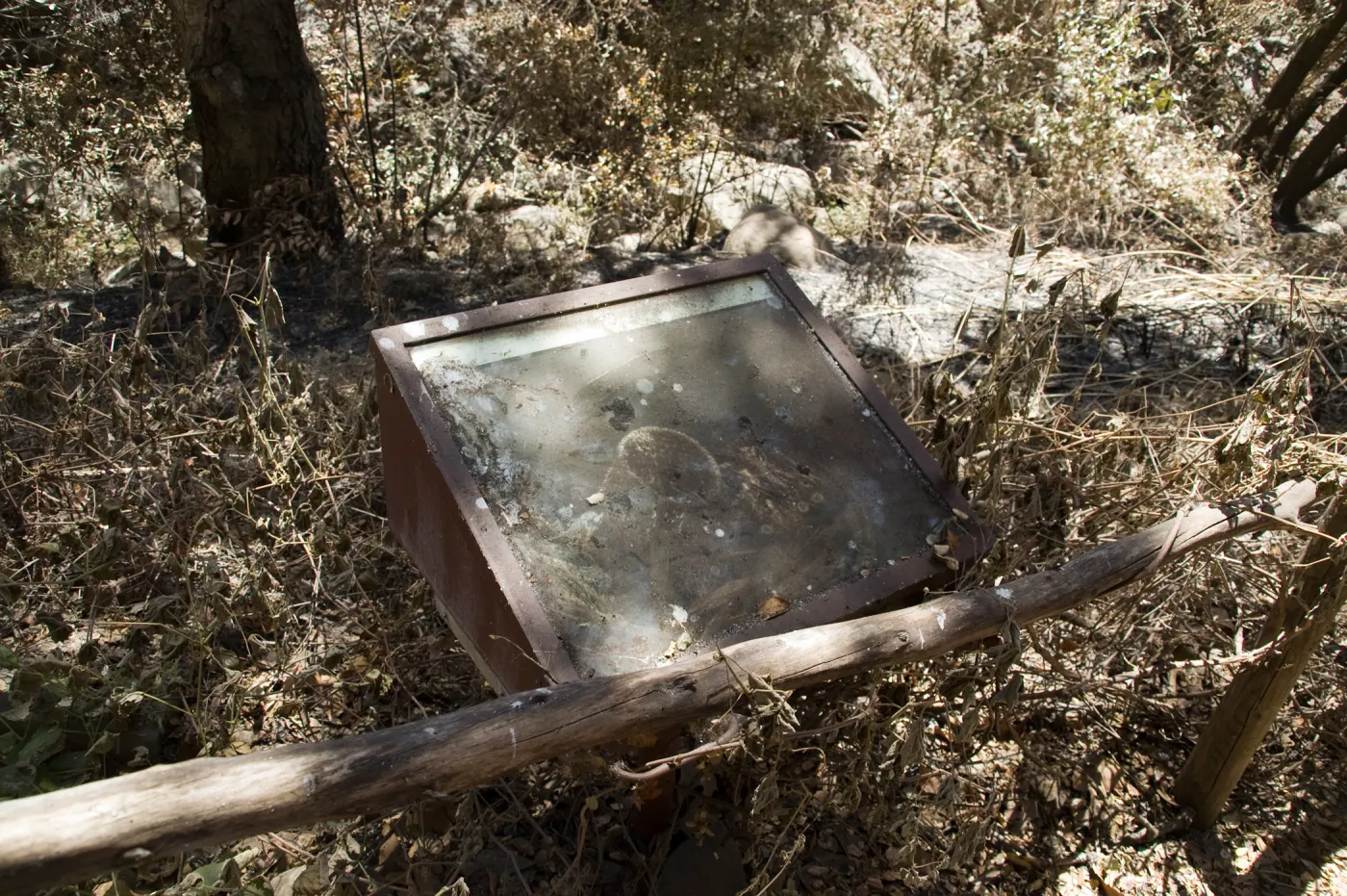 burned Fiber Arts Display case after the Jesusita Fire