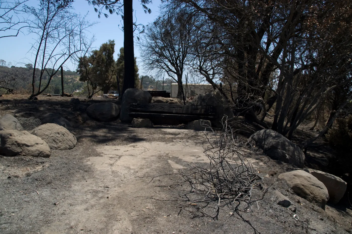 burned Mr. and Mrs. William Stratton Porter Bench (bench #64) at top of Porter Trail after the Jesusita Fire