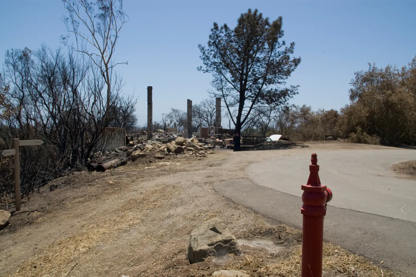 East Slope driveway with water valve,burned Gane House behind, after the Jesusita Fire