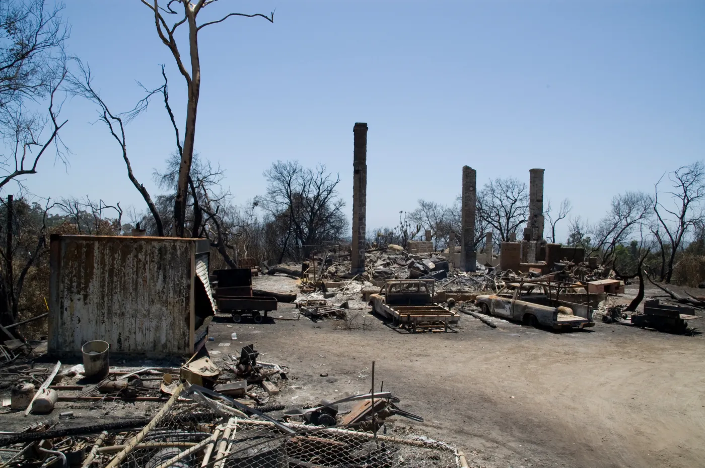burned vehicles at the Gane House, after the Jesusita Fire