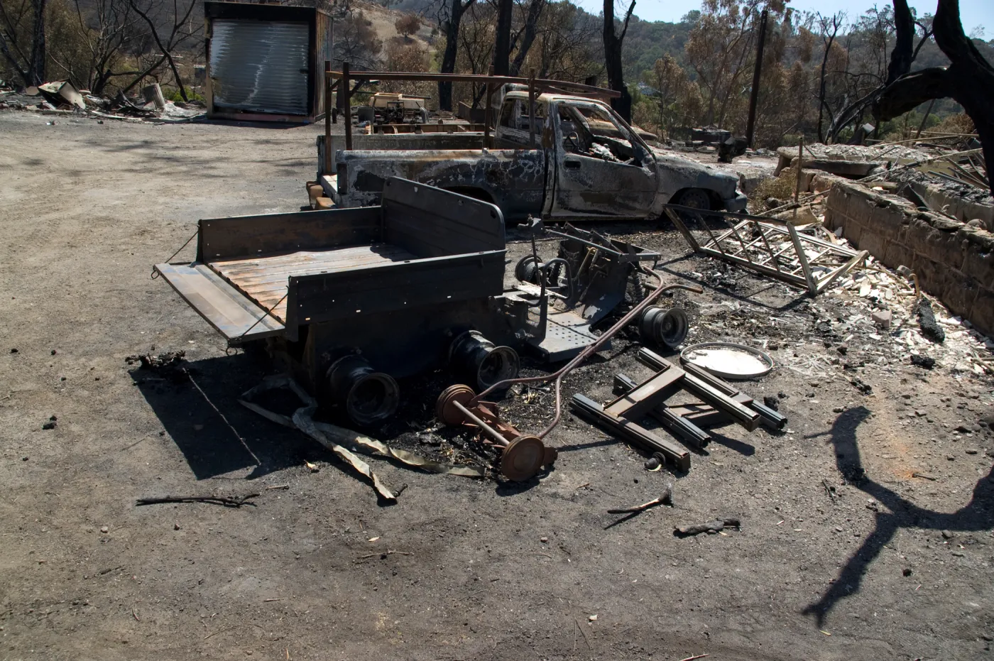 burned vehicles at the Gane House site, after the Jesusita Fire