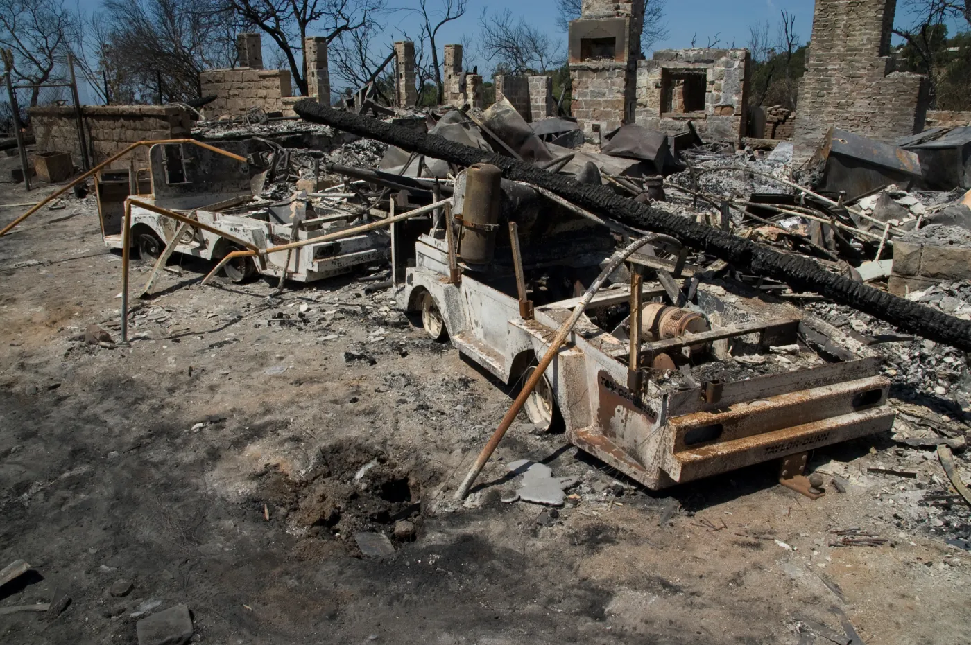 burned vehicles at the Gane House site, after the Jesusita Fire