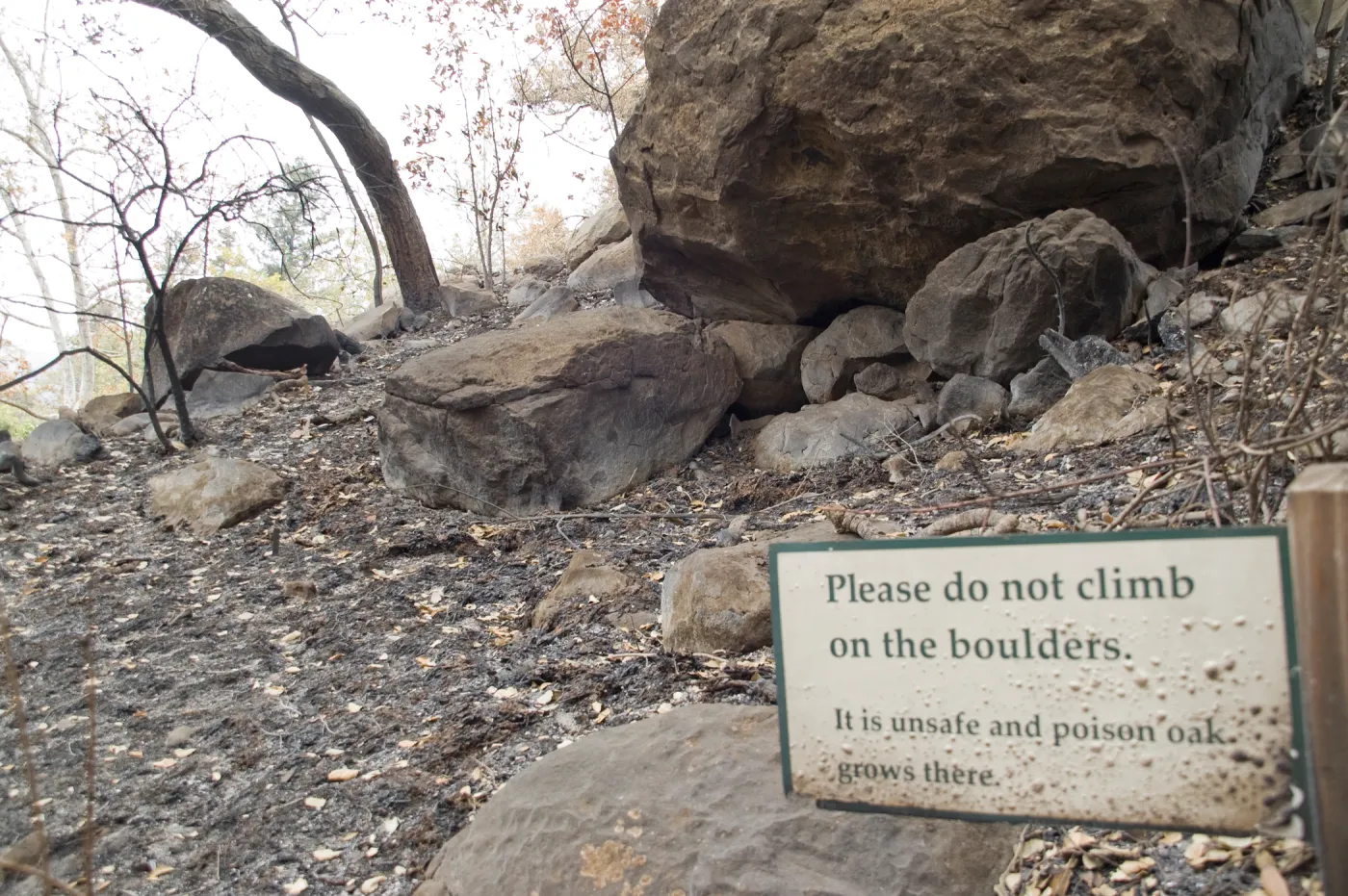 burned sign on Campbell Trail slope, after the Jesusita Fire