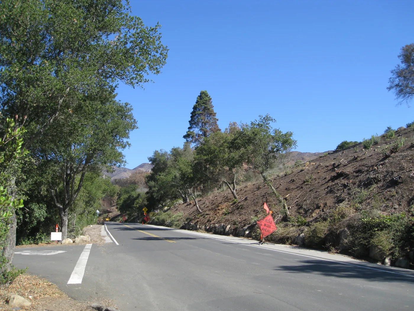 Clearing along Mission Canyon Rd, at parking lot exit
