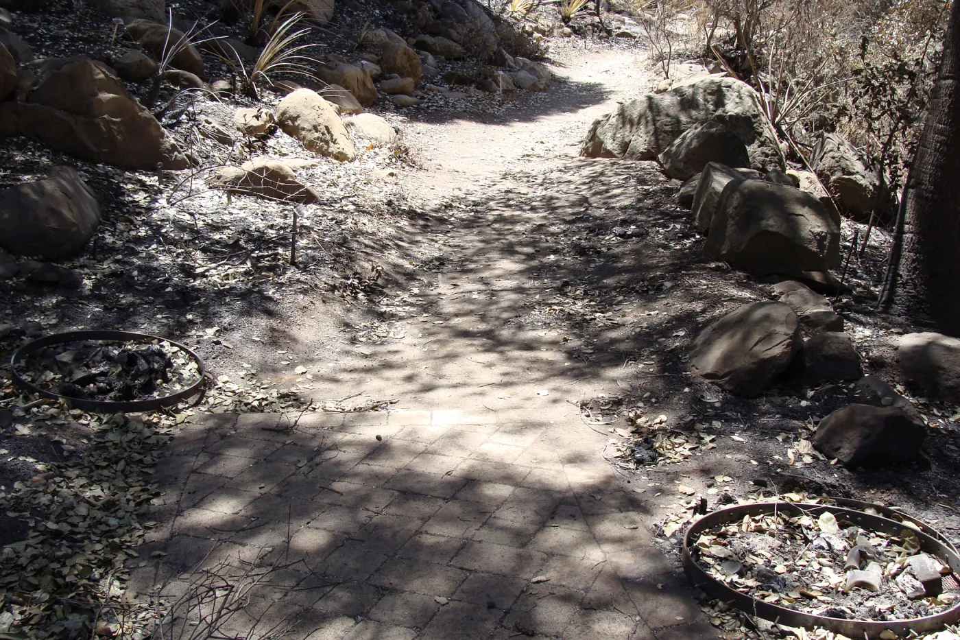 remains of two trash cans at the Picnic Area, after the Jesusita Fire