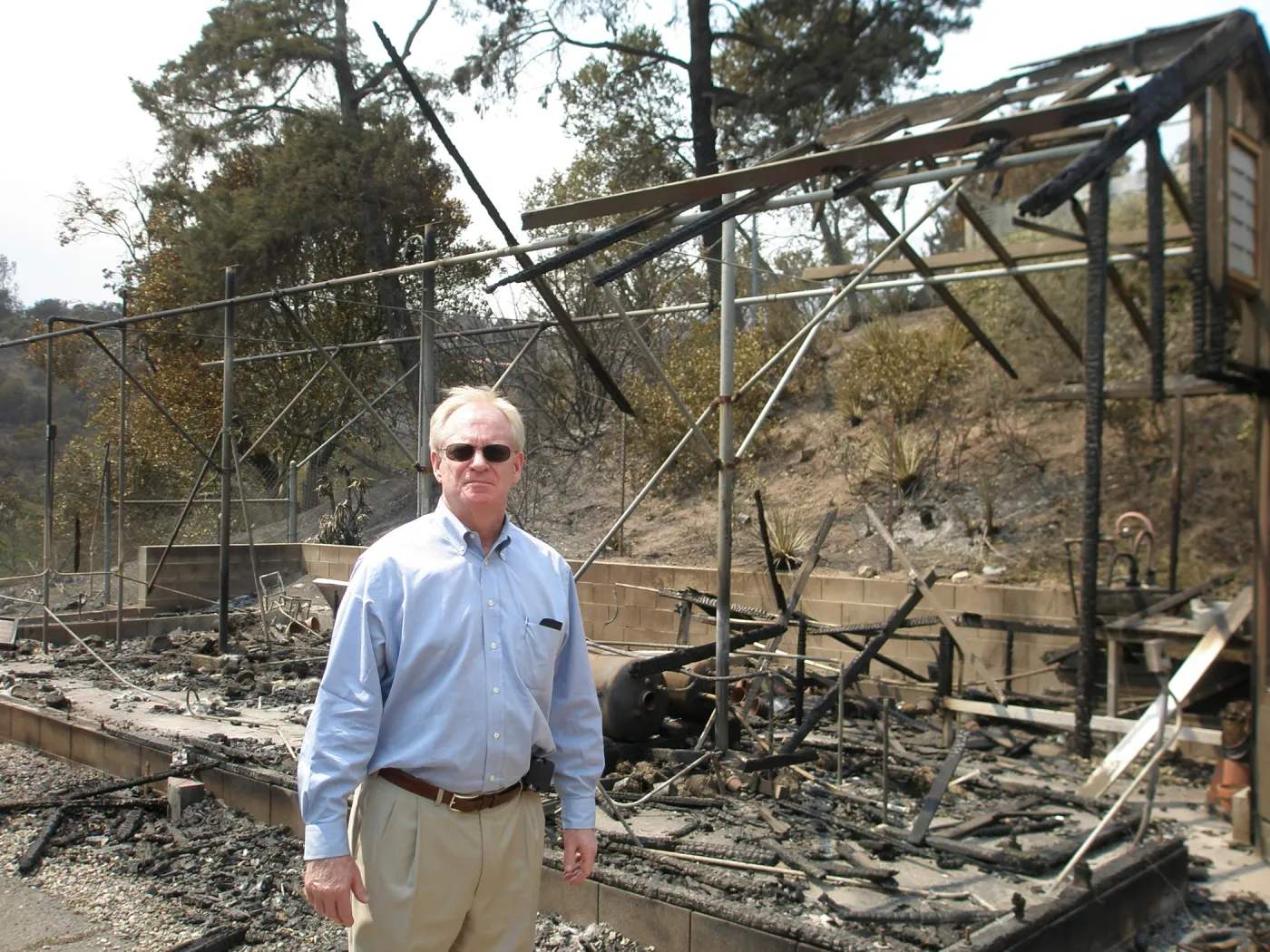 Fife Symington at the burned Myrick lath house, after the Jesusita Fire