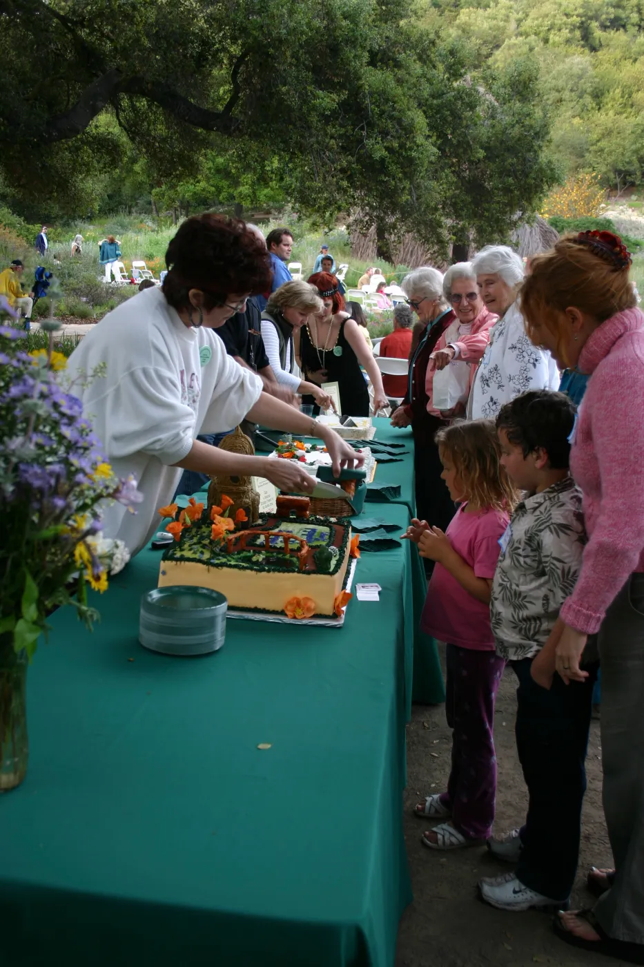 SBBG 80th Birthday Celebration, serving cake