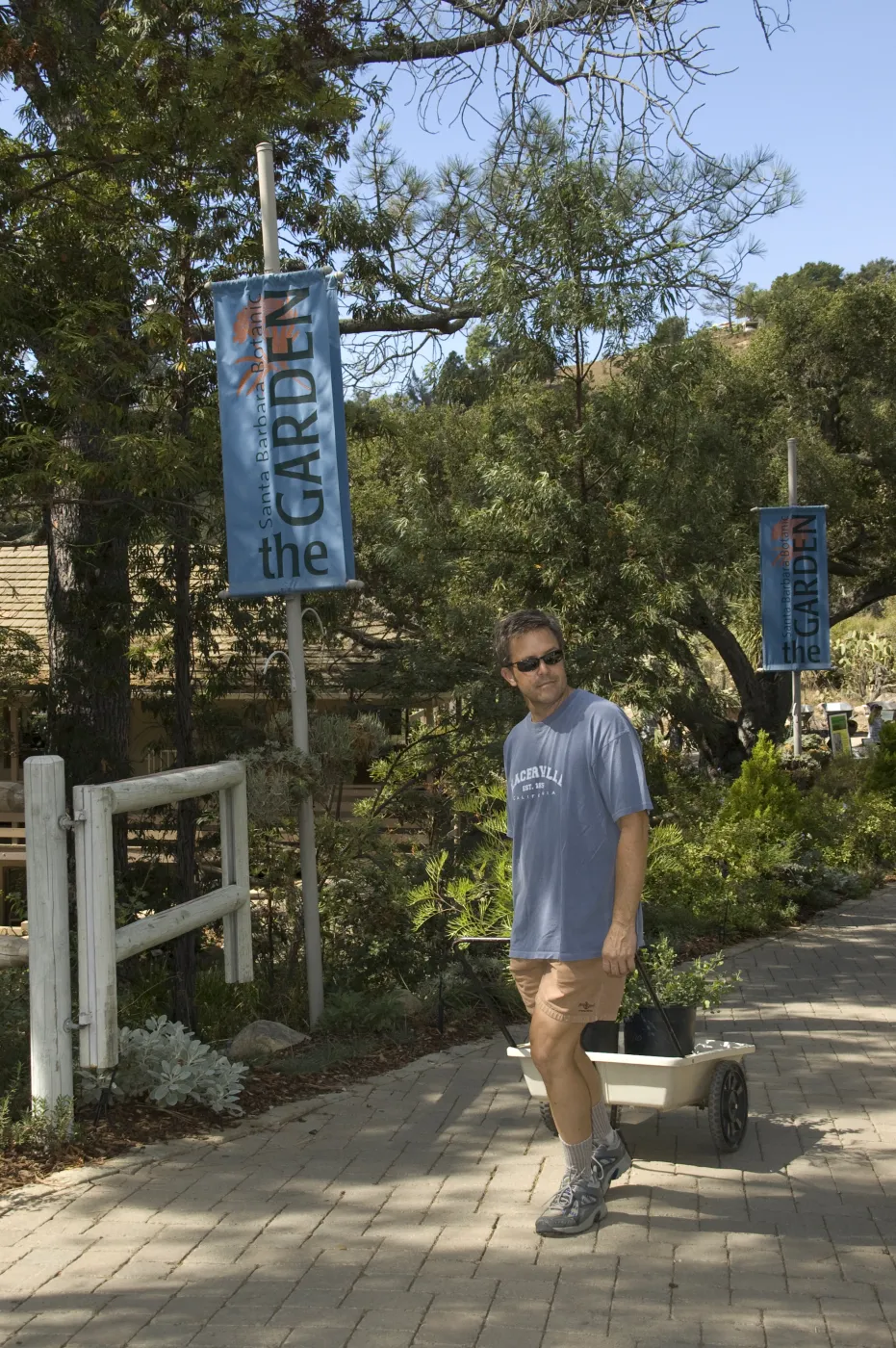 Garden Entrance gate, visitors leaving with plants, SBBG Fall Plant Sale, 2010