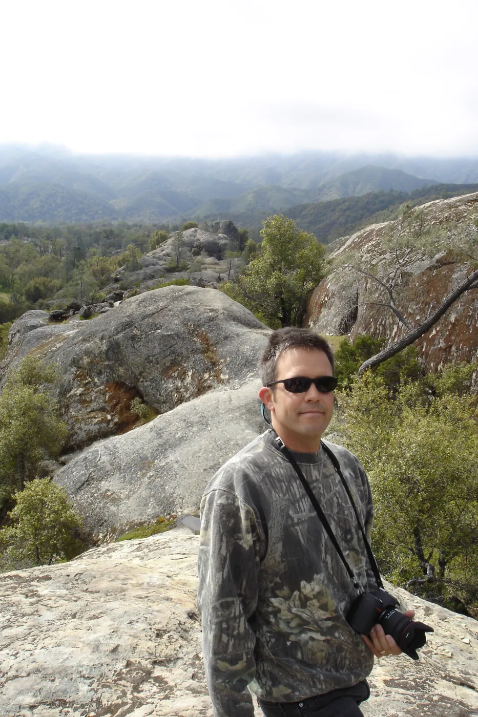 John Wardlaw, view from top of Wagon Caves rock shelter, Fort Hunter Liggett, SBBG Research and Conservation staff field trip, 2006