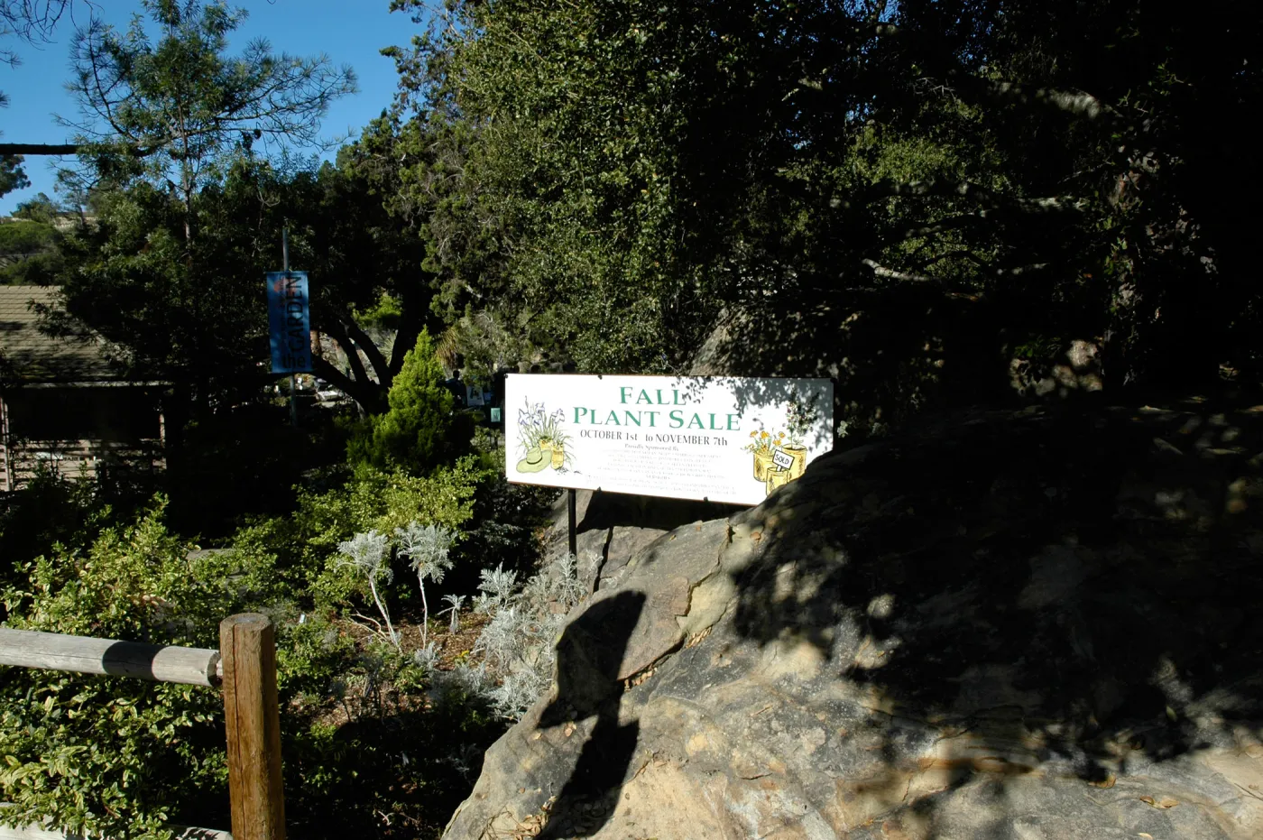 Fall Plant Sale banner at Garden Entrance boulders