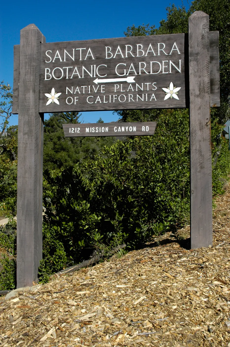 Santa Barbara Botanic Garden sign at Mission Canyon Road entrance to parking lot