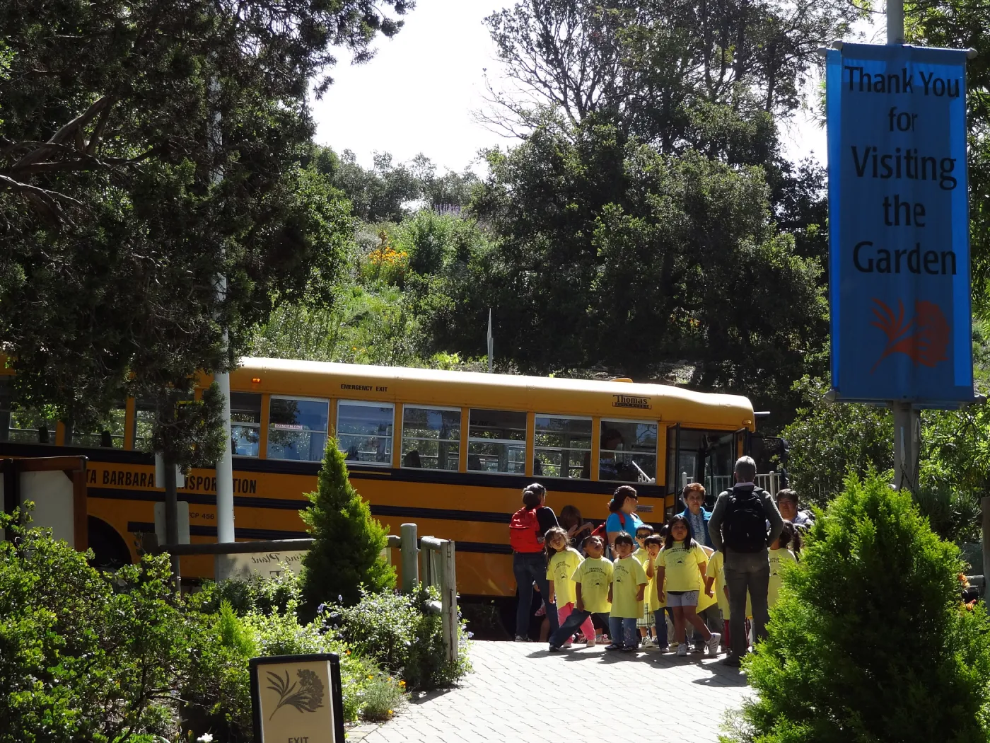 school bus arriving at Garden Entrance