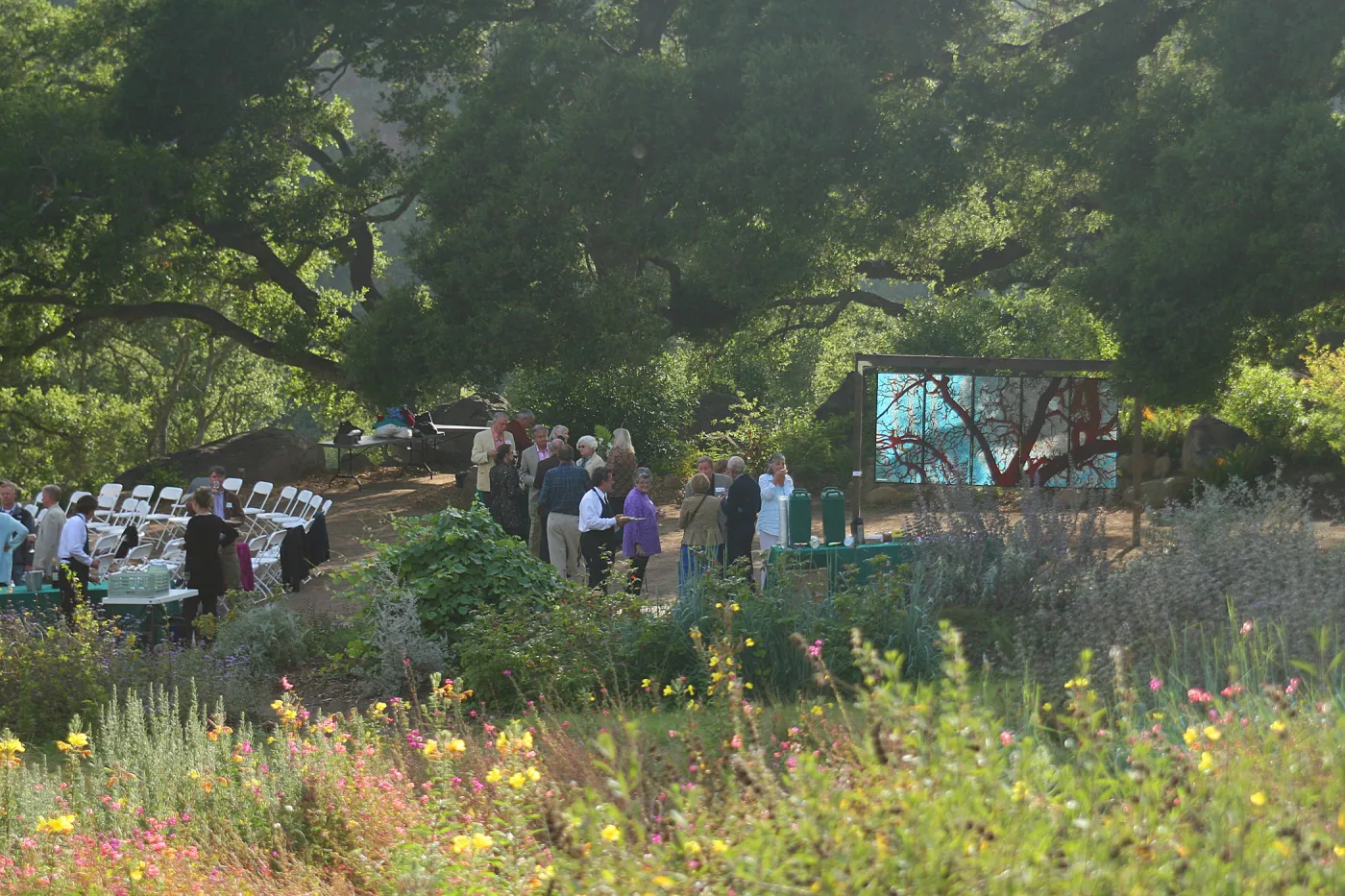 stained glass art exhibit, under the Meadow Oaks. Rose and Nightingale concert in the Garden event