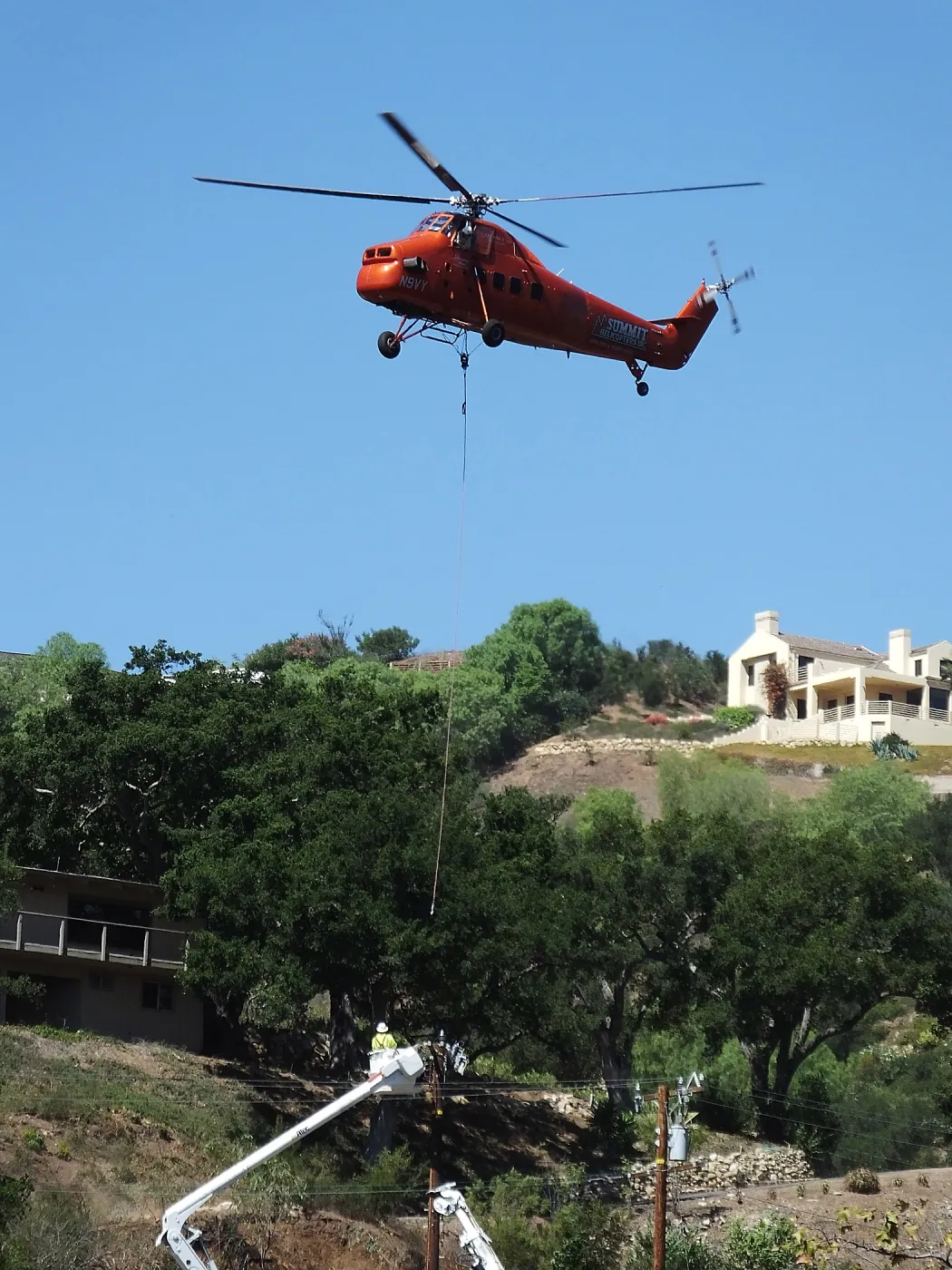 Sikorsky S-58T Screaming Mimi helicopter replacing utility pole in west Mission Canyon