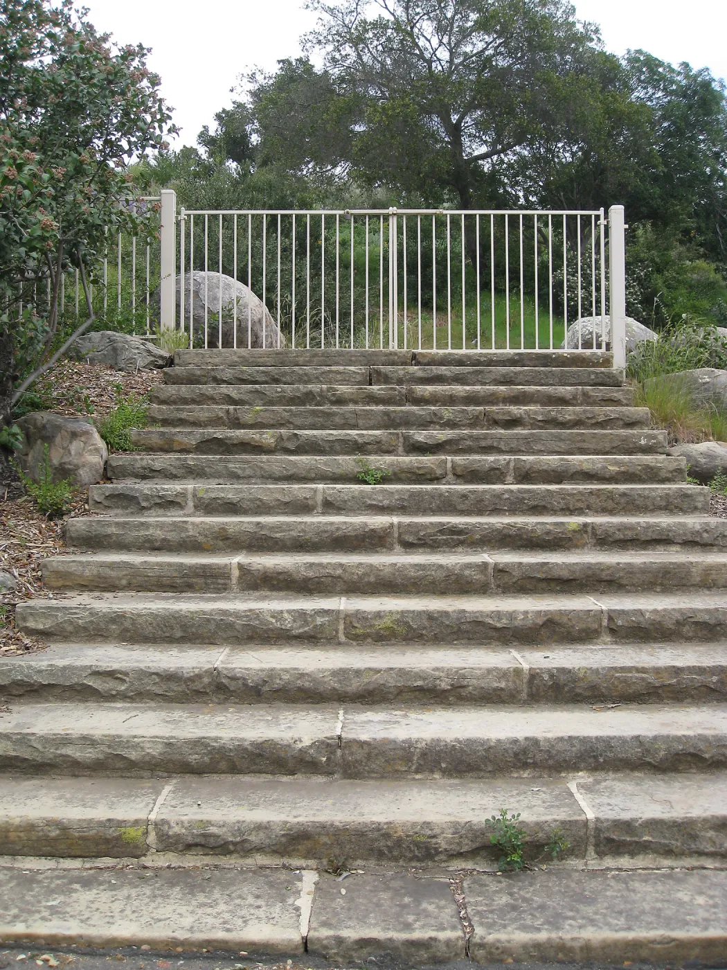 Steps from parking lot to Mission Canyon Rd