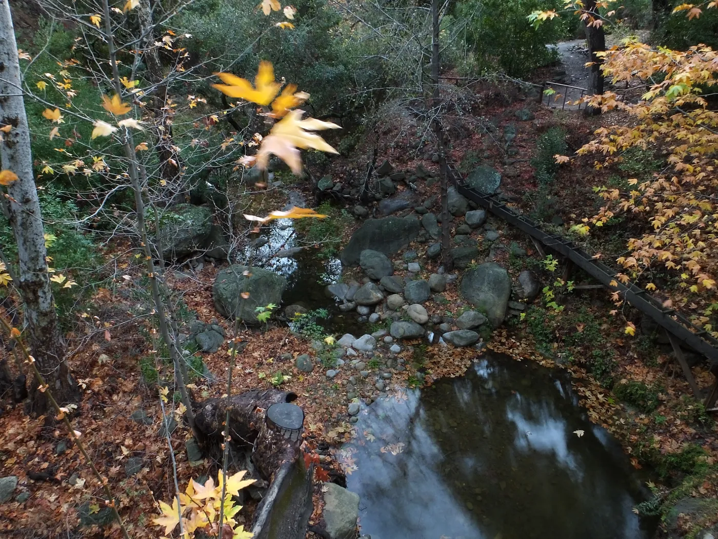 Mission Aqueduct and pool below Mission Dam after rain
