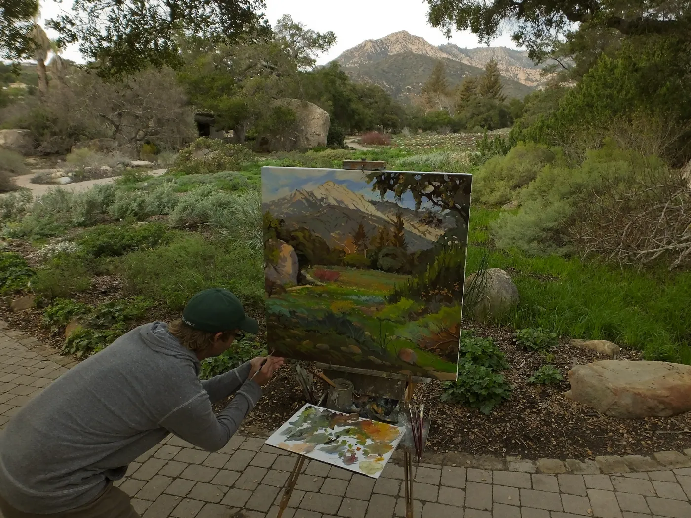 Plein Air artist Chris Potter signs painting of Meadow