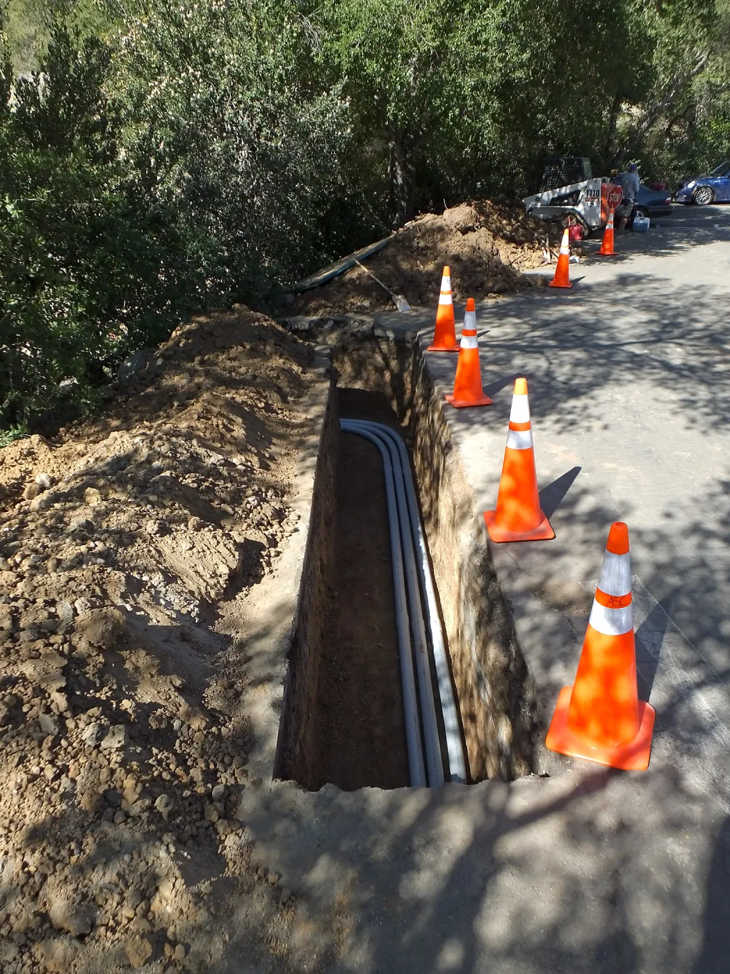 Power and data conduit being installed in the Arroyo Section