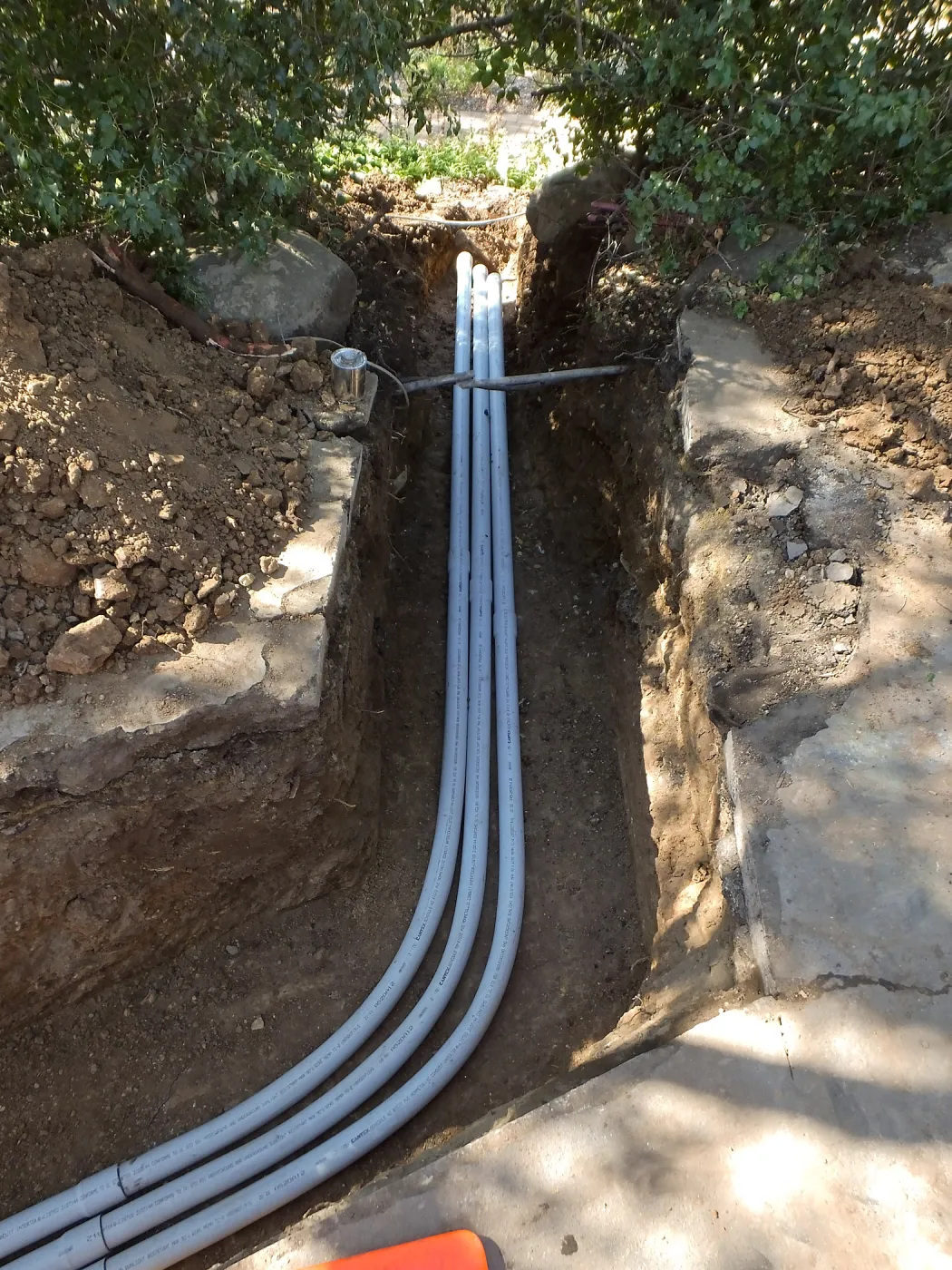 Power and data conduit being installed in the Arroyo Section
