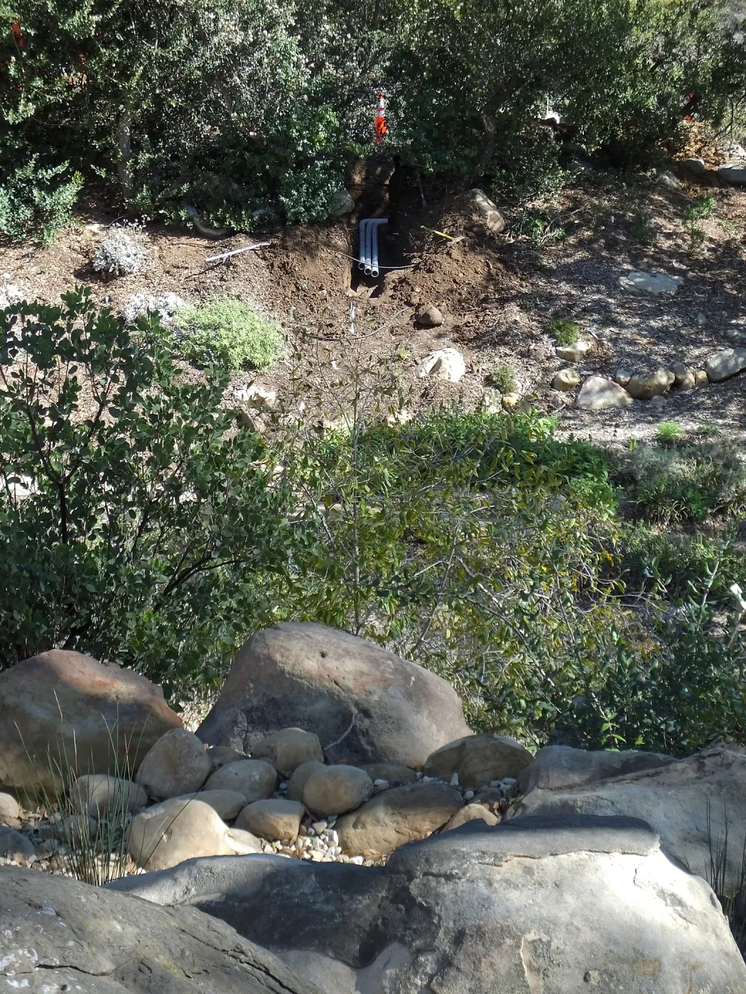 Power and data conduit being installed in the Arroyo Section