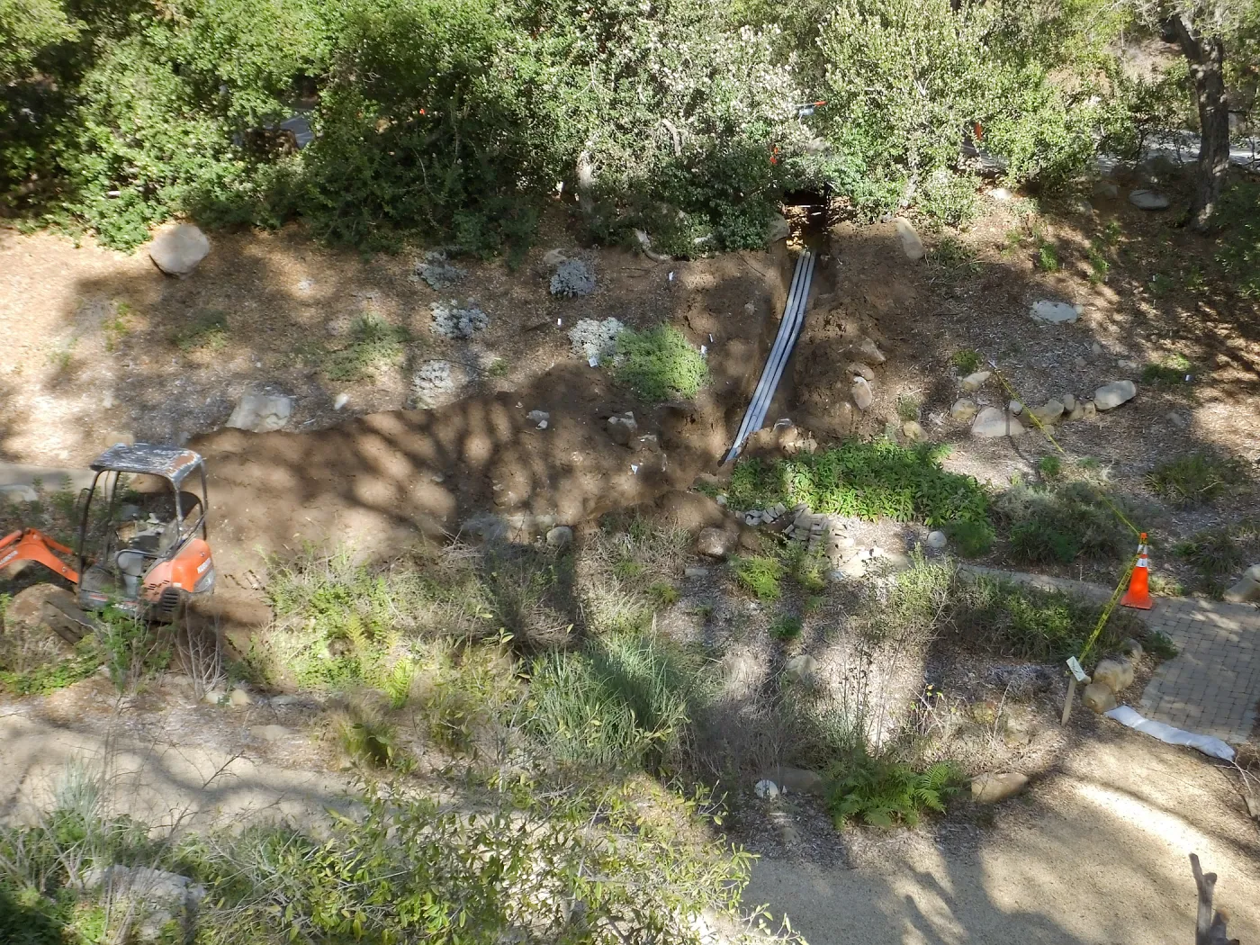Power and data conduit being installed in the Arroyo Section