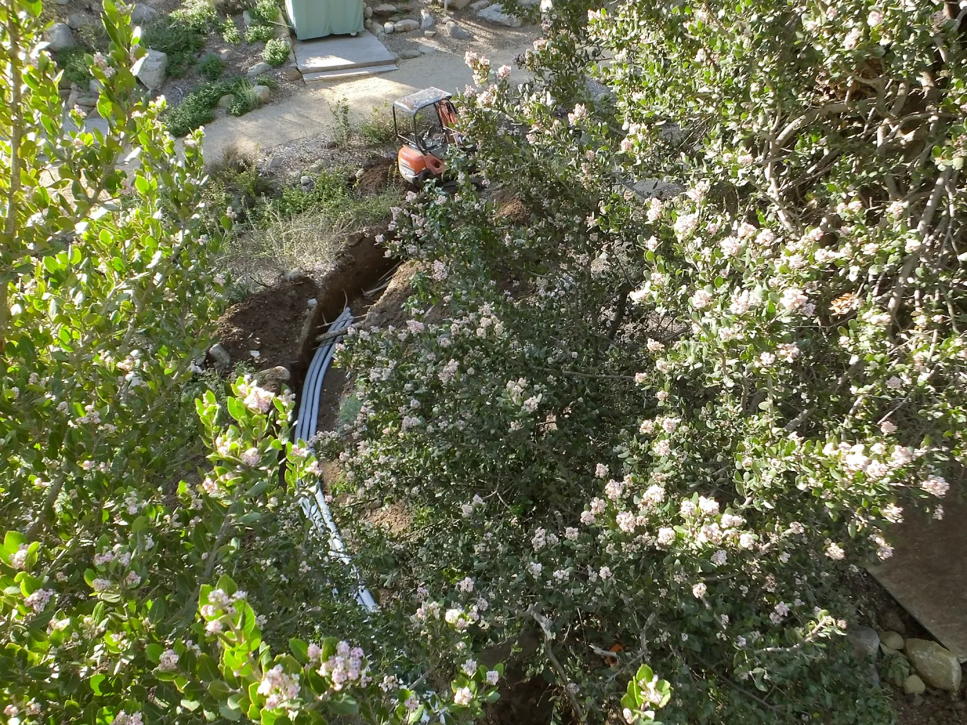 Power and data conduit being installed in the Arroyo Section