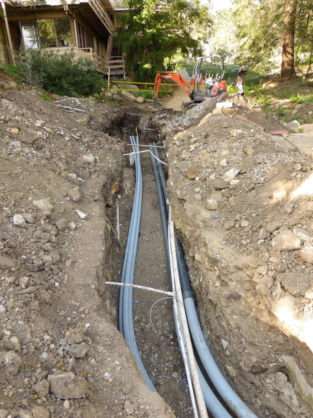Power and data conduit being installed in the Arroyo Section