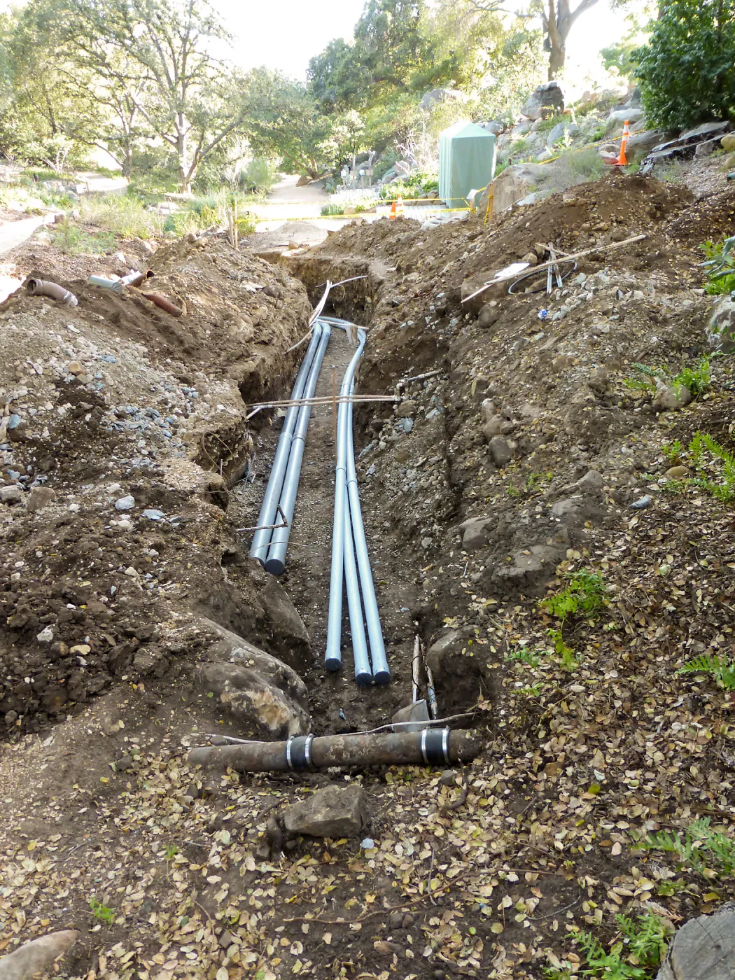 Power and data conduit being installed in the Arroyo Section