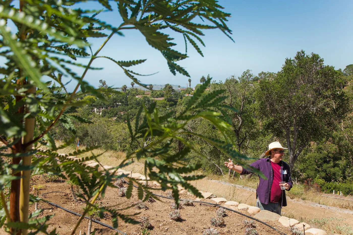 Pritzlaff Conservation Center Ribbon Cutting Celebration, Bruce Reed leading tour of newly planted Island View Garden