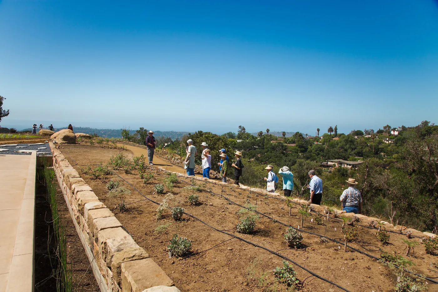 Pritzlaff Conservation Center Ribbon Cutting Celebration, Bruce Reed leading tour of newly planted Island View Garden