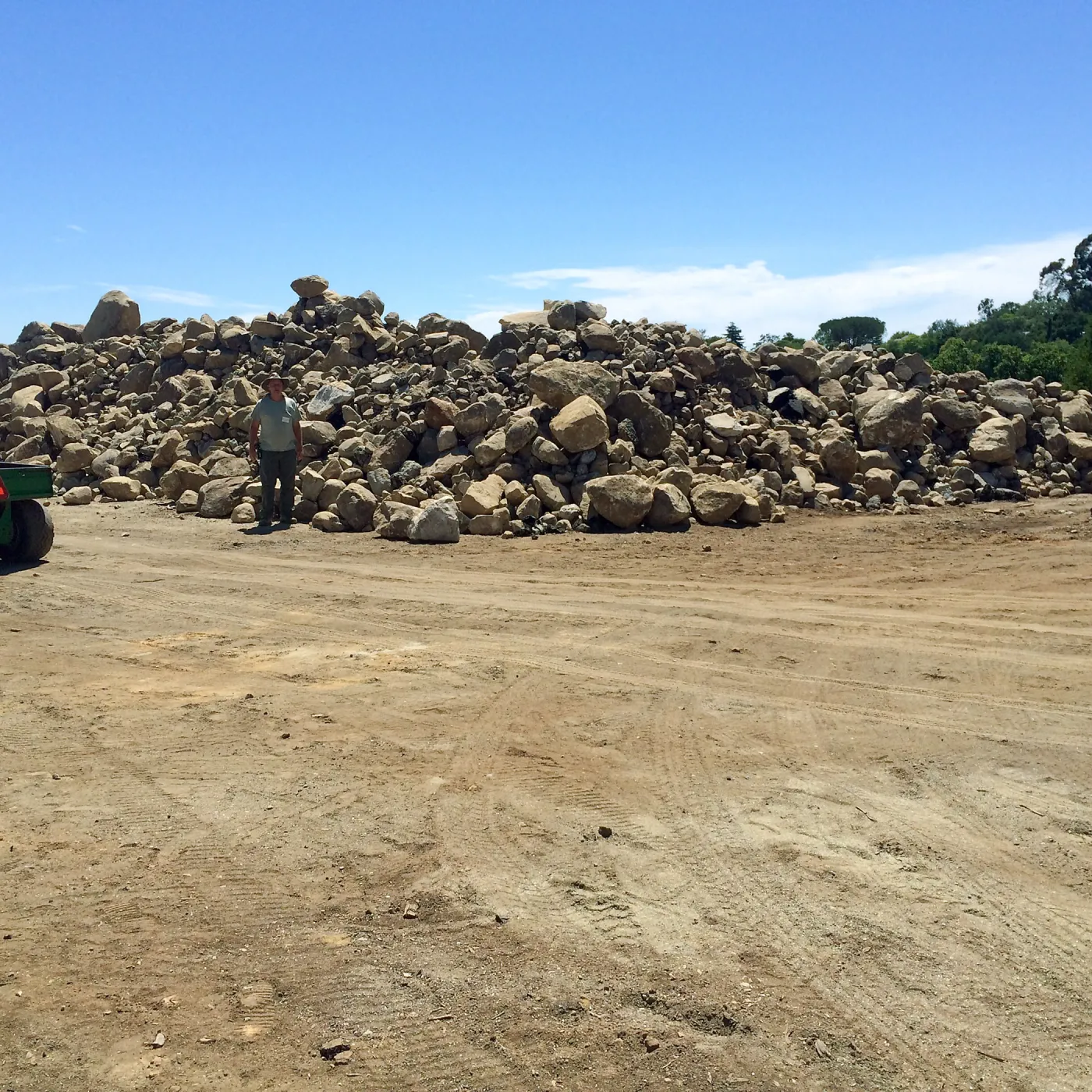 Rock pile at Gane House site, with Dave Kershaw