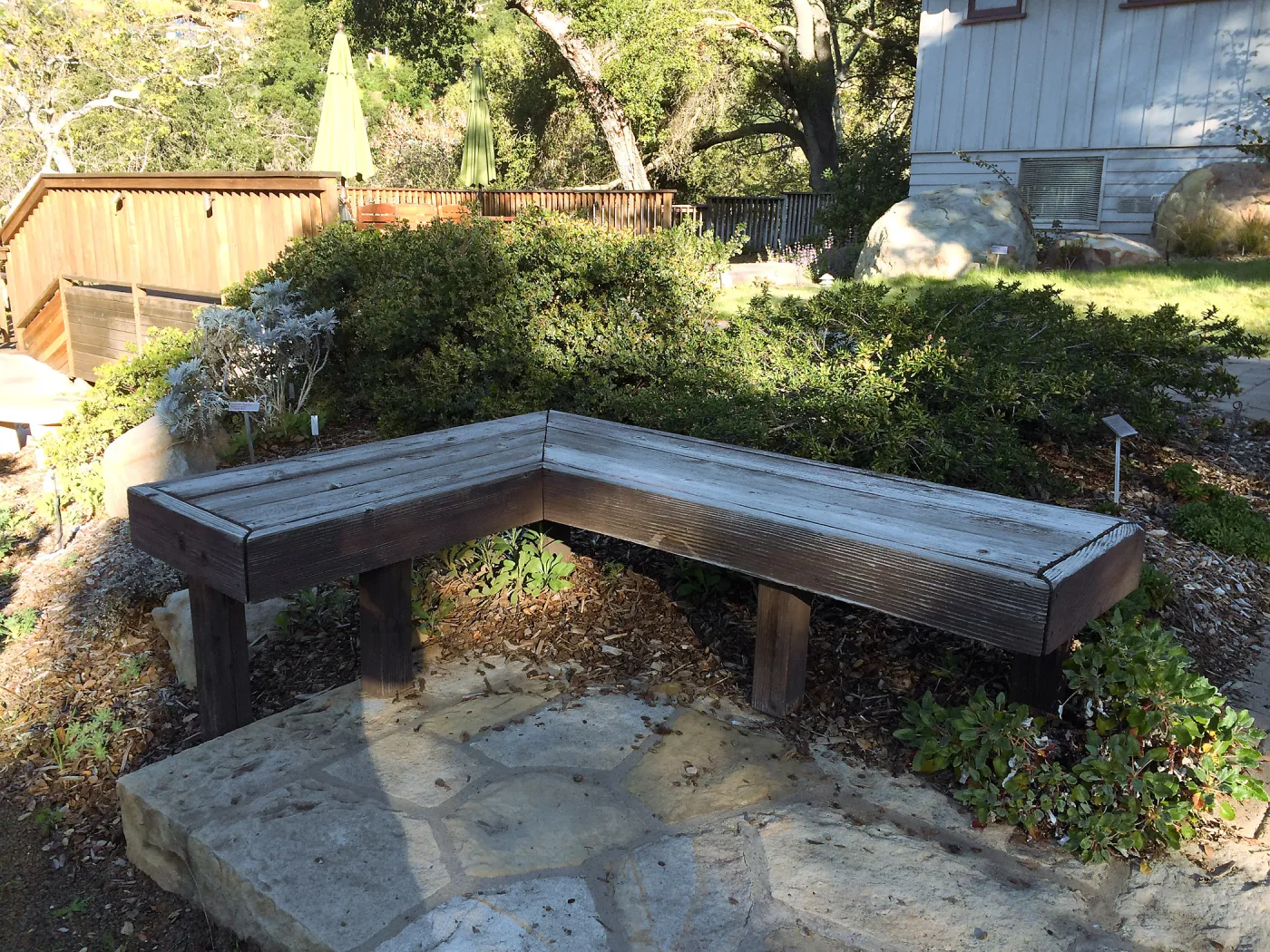 Wood benches at Home Demonstration Garden entrance