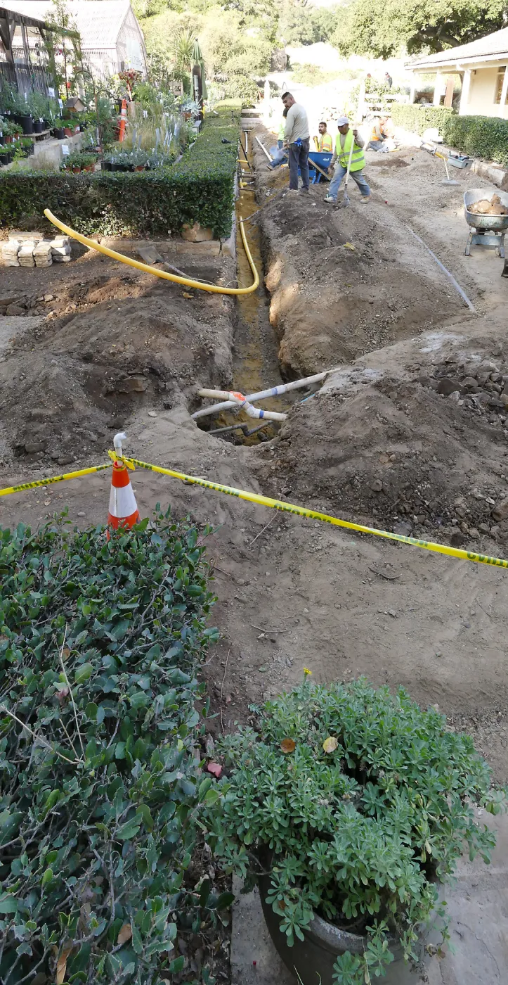 Courtyard renovation, rerouting piping, west edge looking north