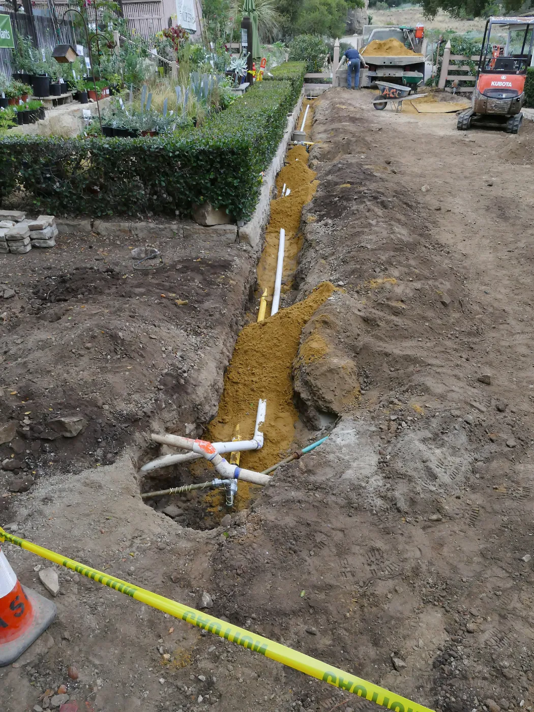 Courtyard renovation, rerouting piping, west edge looking north