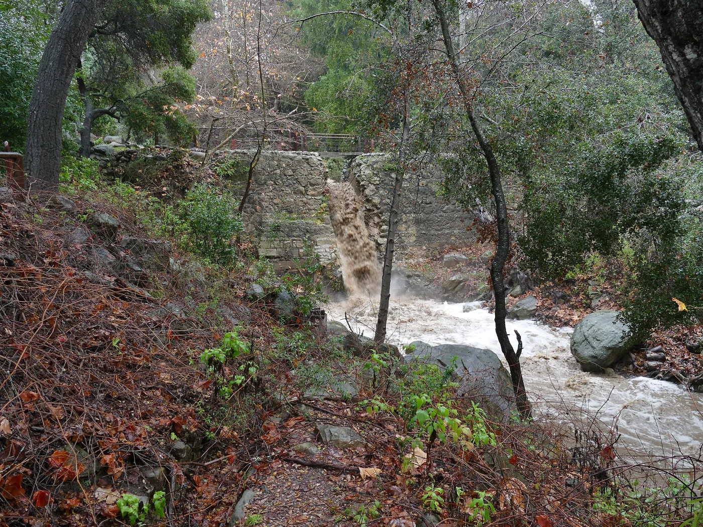Misson Dam waterfall during rainstorm