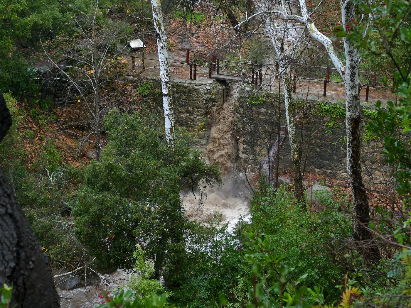Misson Dam waterfall during rainstorm