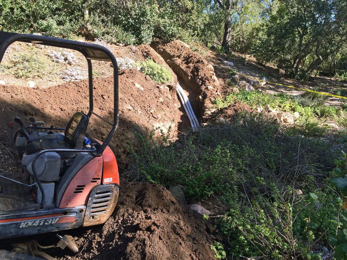 Power and data conduit being installed in the Arroyo Section