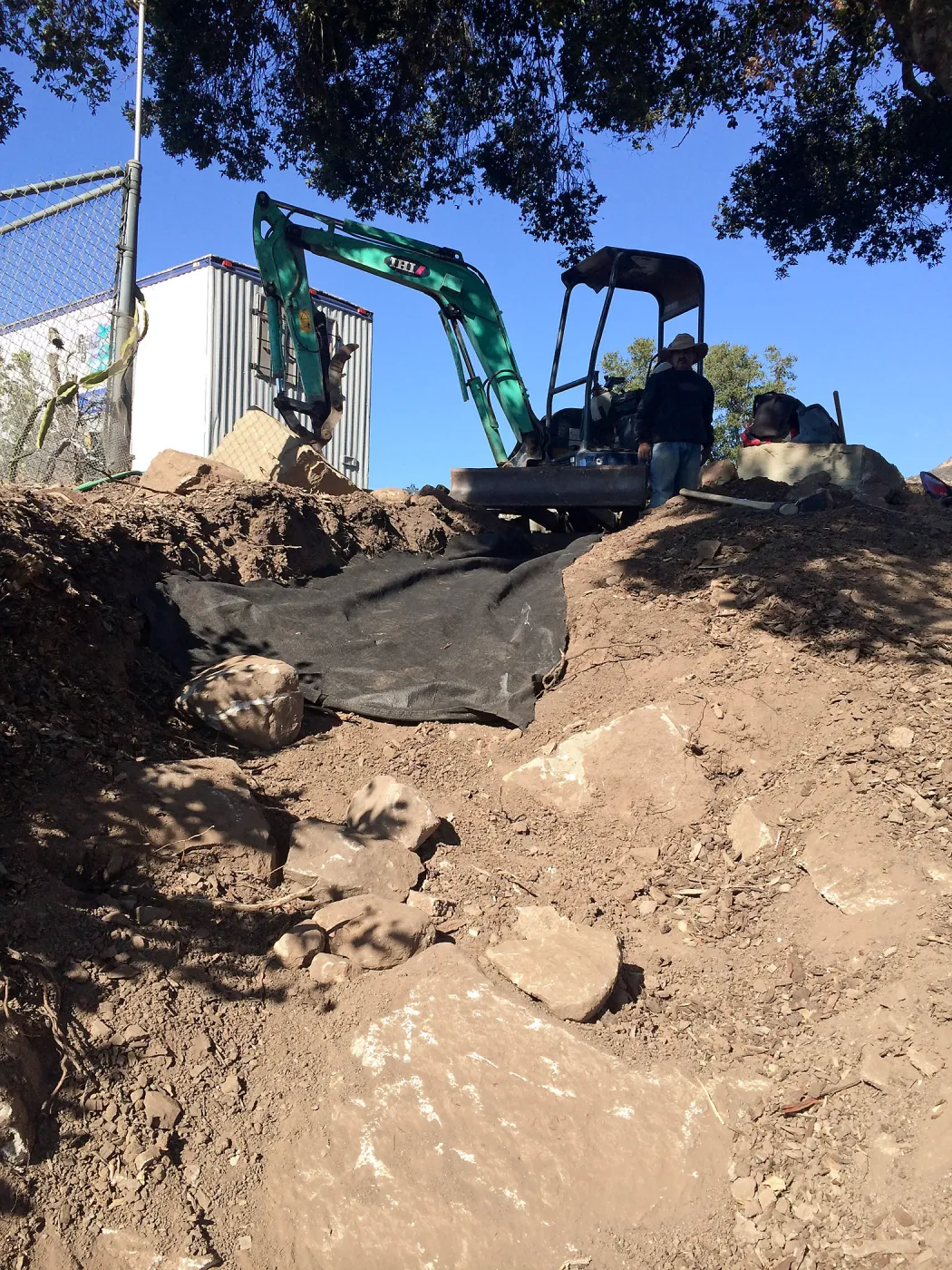 Construction of drainage culvert southeast corner of upper parking lot.