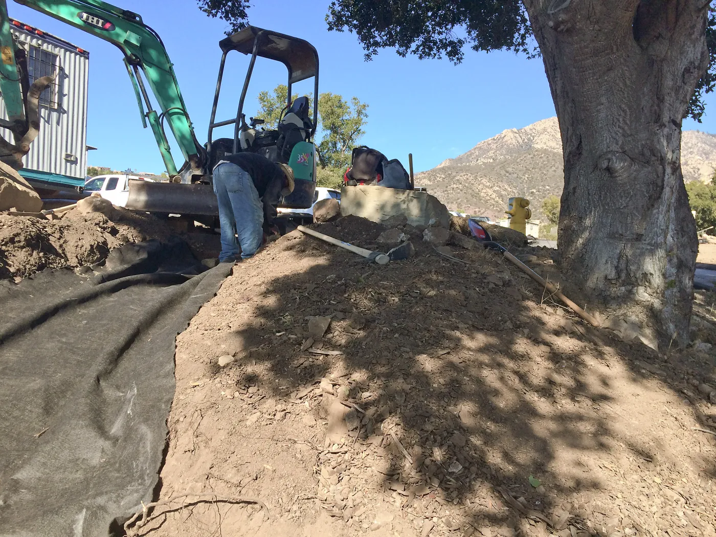 Construction of drainage culvert southeast corner of upper parking lot.