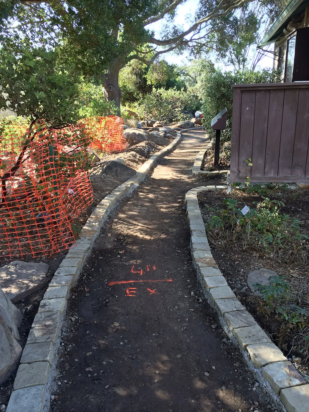 Preparing new path to Cottage and Water Wise Home Garden