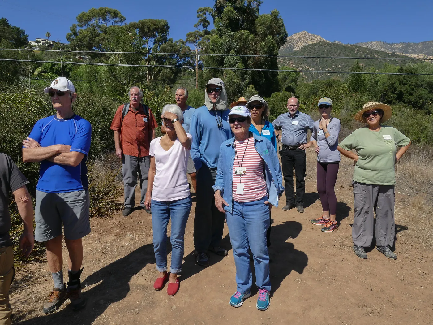 Tour of Pritchett Trail renovations, participants enjoying view from top of Island View Spur