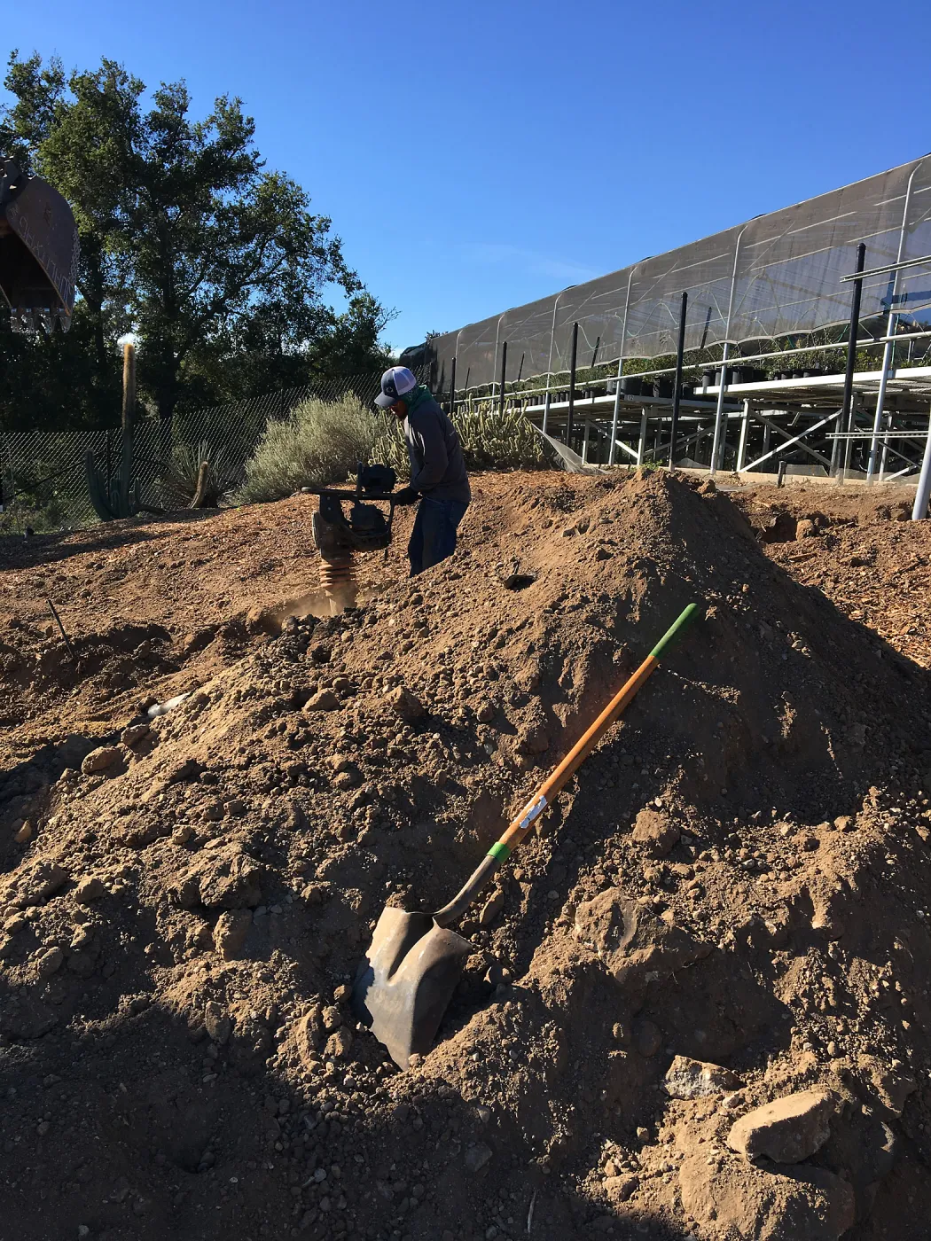 Putting in new electrical line to Horticulture Head House