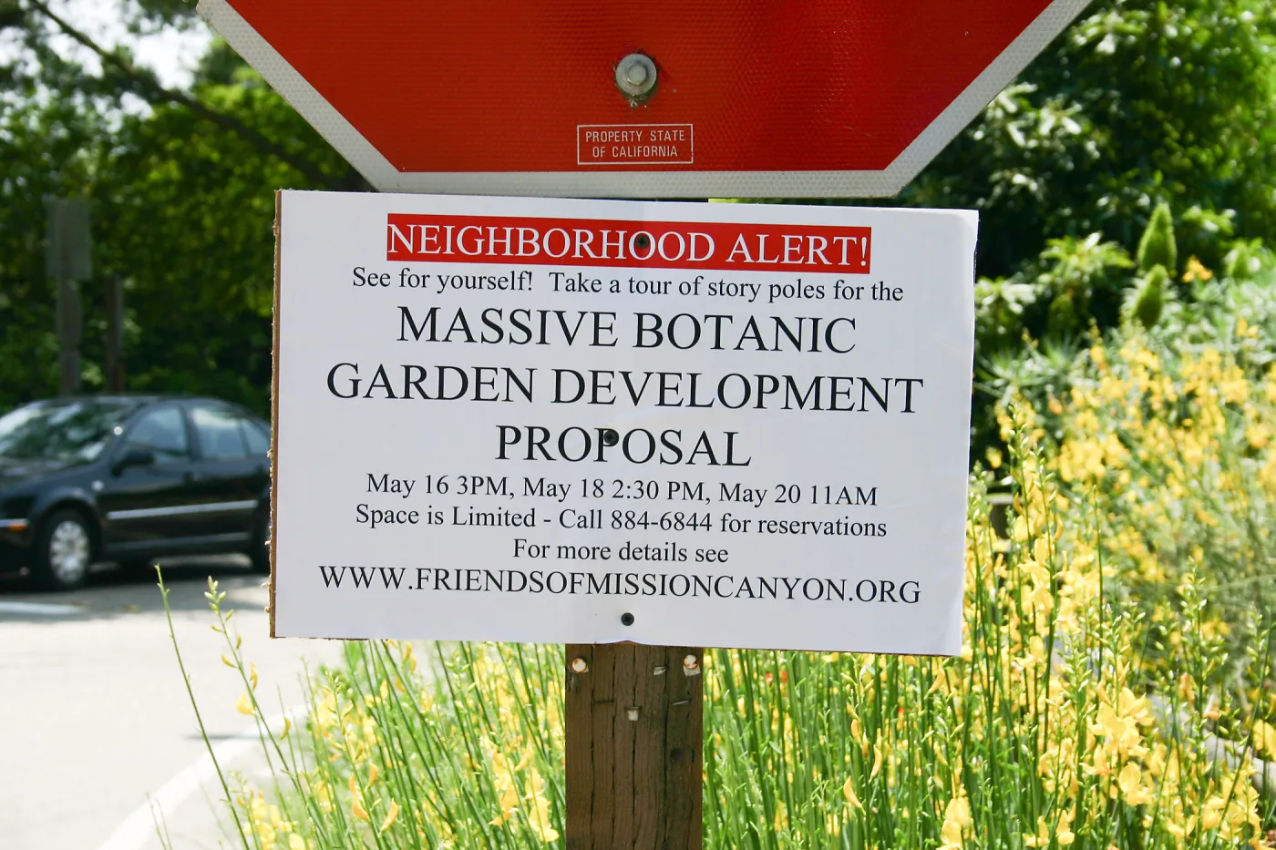 Sign advertising Friends of Mission Canyon tour of Vital Mission Plan story poles.