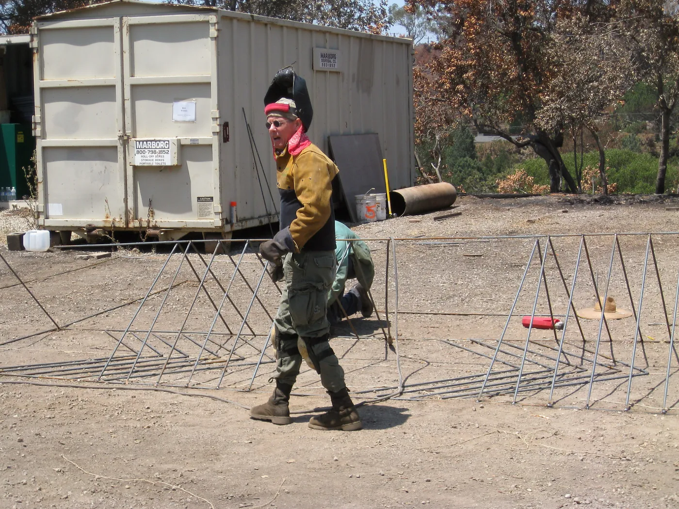 Construction of Herb Parker's â€˜Haven' labyrinth, welding roof framework, Herb Parker