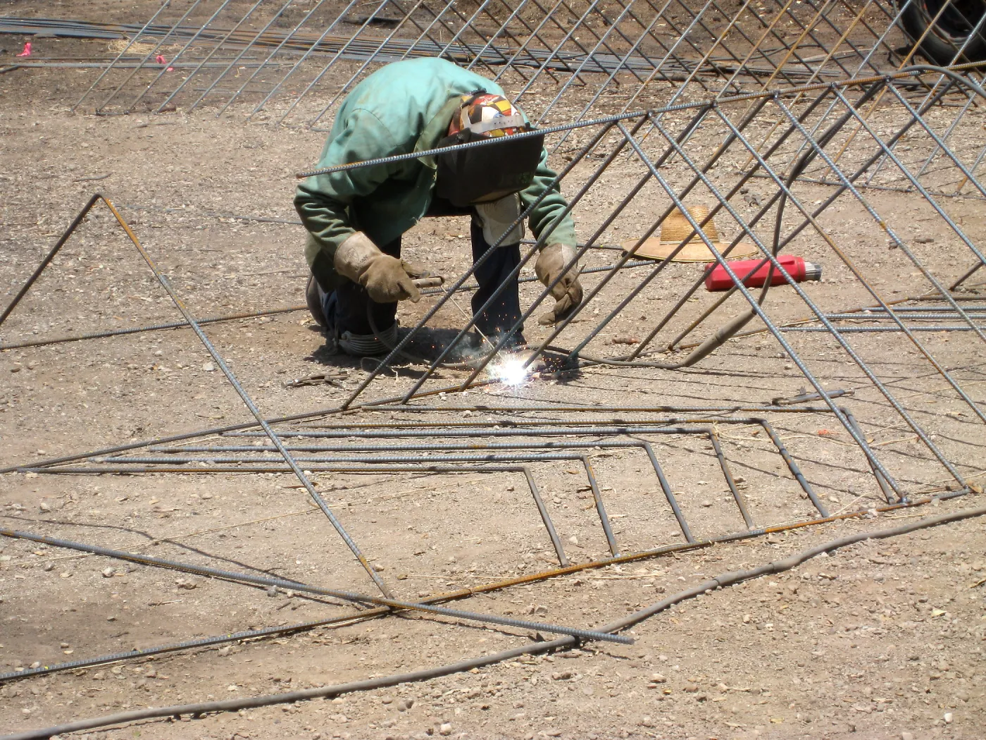 Construction of Herb Parker's â€˜Haven' labyrinth, welding roof framework