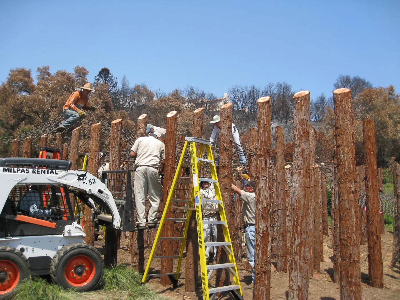 Construction of Herb Parker's â€˜Haven' labyrinth, placing roof structure