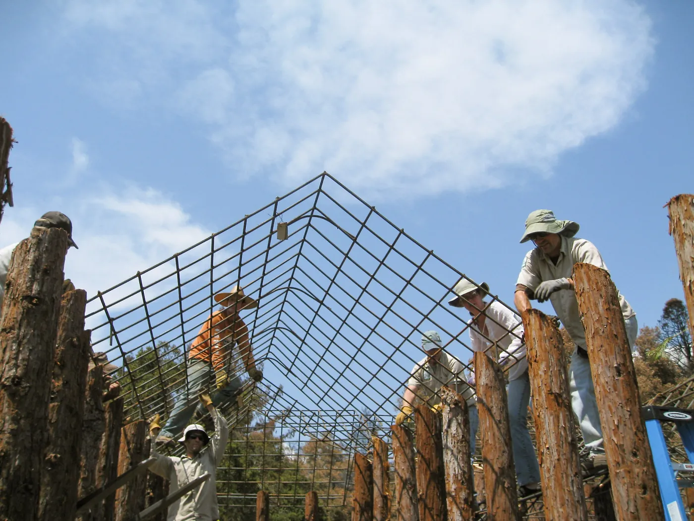 Construction of Herb Parker's â€˜Haven' labyrinth, placing roof structure