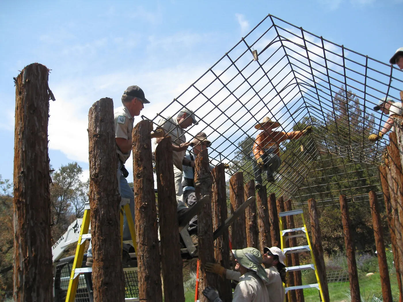 Construction of Herb Parker's â€˜Haven' labyrinth, placing roof structure